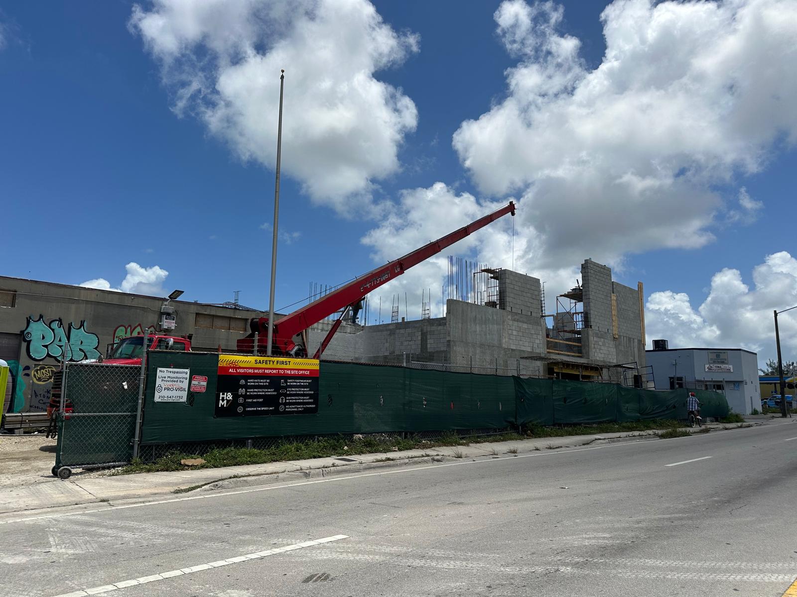 Crane lifting materials during construction