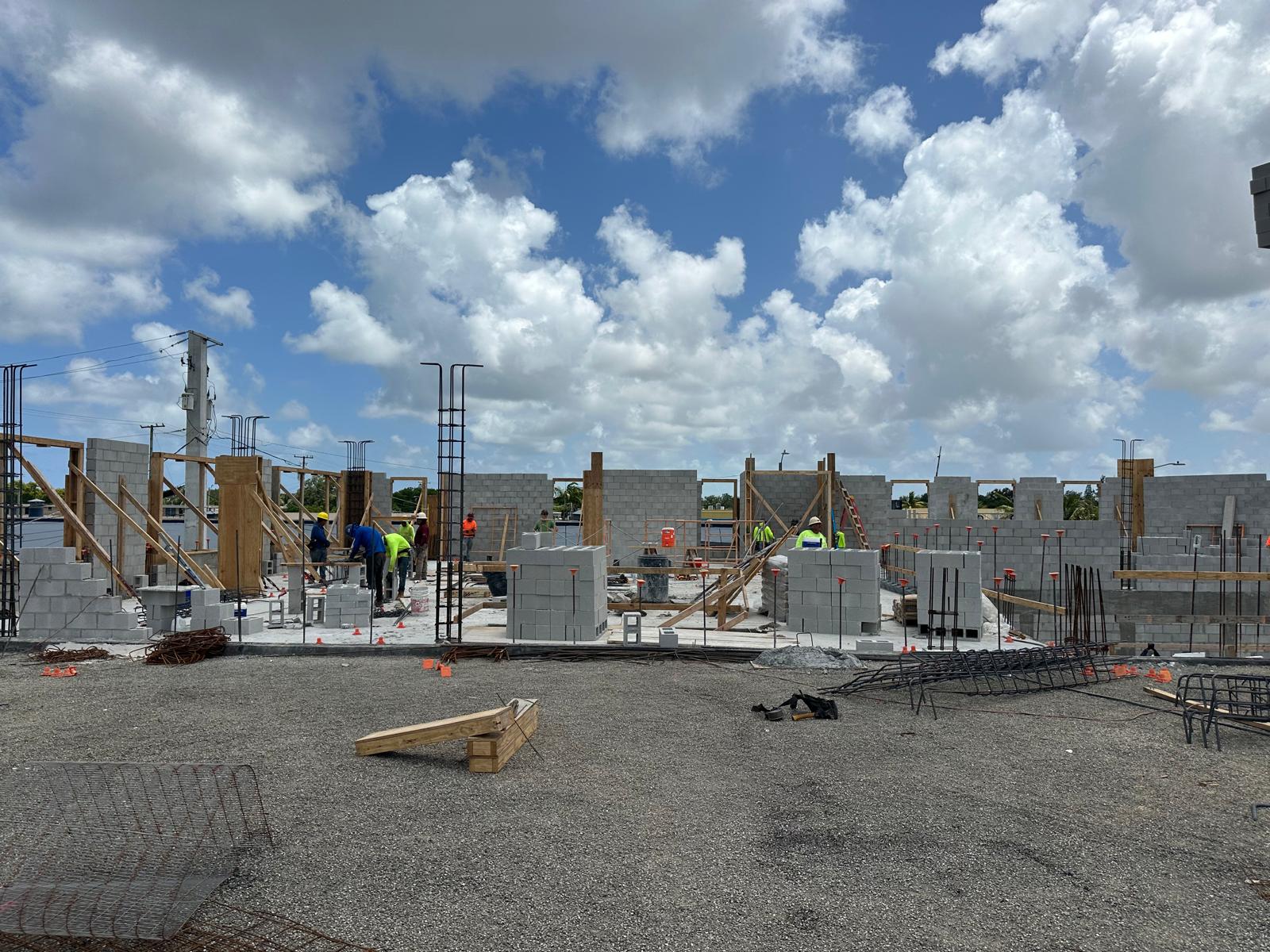 Masonry crew laying block walls